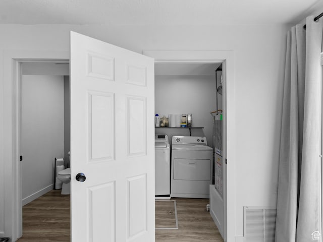1929 W 680 N, Pleasant Grove, UT 84062 - laundry room featuring wood finished floors, laundry area, separate washer and dryer, and visible vents