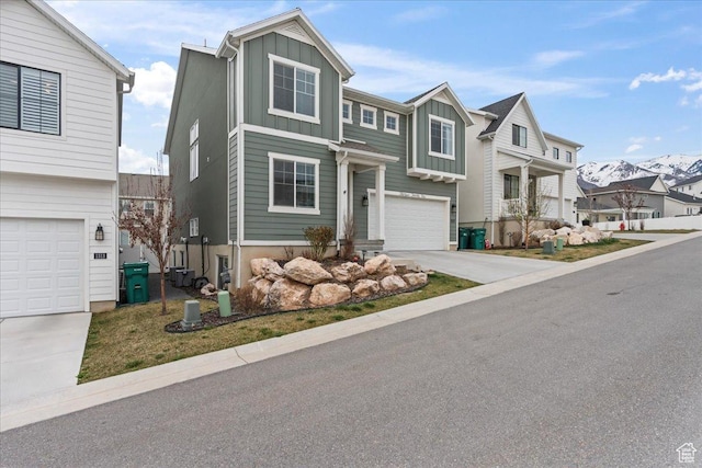 1321 E Daffodil Ct N Unit 155, Layton, UT 84040 - traditional home featuring driveway, an attached garage, and board and batten siding