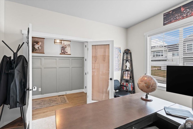 1321 E Daffodil Ct N Unit 155, Layton, UT 84040 - office area with a decorative wall and wood finished floors