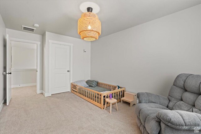 1321 E Daffodil Ct N Unit 155, Layton, UT 84040 - bedroom featuring light carpet, baseboards, and visible vents
