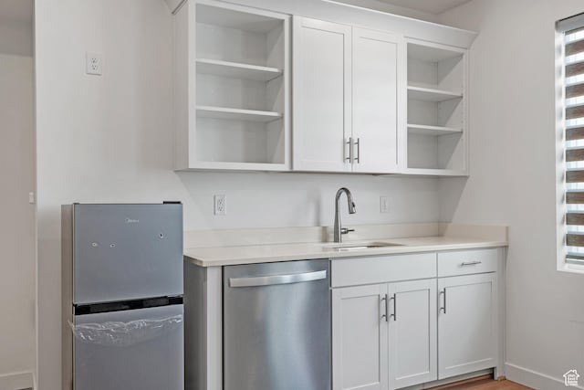 217 S Buckhorn Bath Ave W, Saratoga Springs, UT 84045 - bar featuring a sink and stainless steel appliances