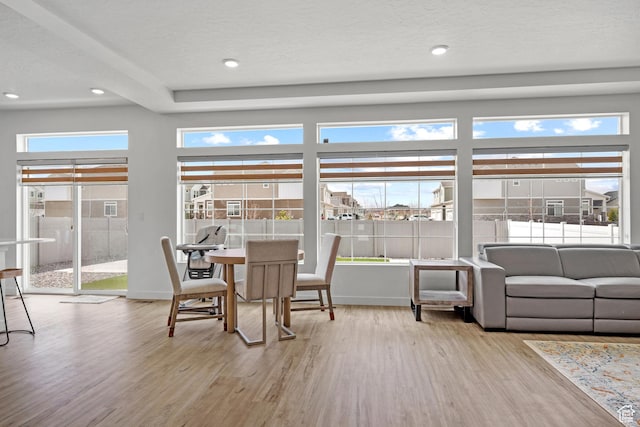 217 S Buckhorn Bath Ave W, Saratoga Springs, UT 84045 - dining area featuring baseboards, wood finished floors, recessed lighting, and a textured ceiling