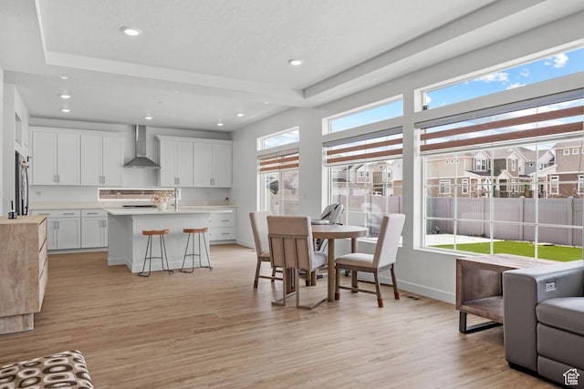 217 S Buckhorn Bath Ave W, Saratoga Springs, UT 84045 - dining area featuring plenty of natural light, baseboards, light wood-type flooring, and recessed lighting