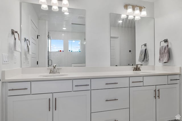 217 S Buckhorn Bath Ave W, Saratoga Springs, UT 84045 - bathroom featuring a shower stall, double vanity, and a sink