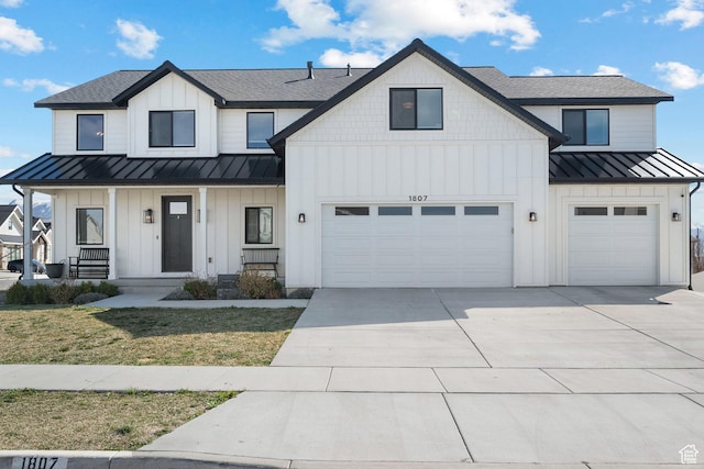 1807 S Bridle Path Loop, Lehi, UT 84043 - modern inspired farmhouse with concrete driveway, a standing seam roof, and board and batten siding