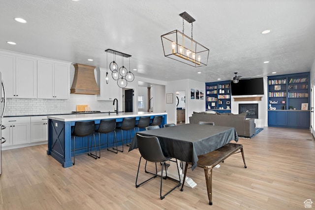 1807 S Bridle Path Loop, Lehi, UT 84043 - dining space with light wood finished floors, a textured ceiling, and recessed lighting