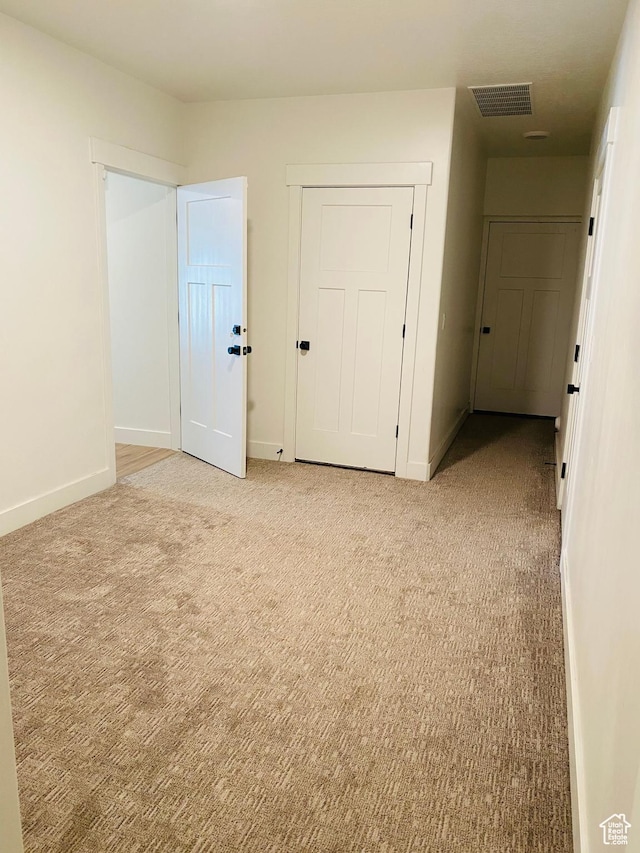 1807 S Bridle Path Loop, Lehi, UT 84043 - unfurnished bedroom with a closet, visible vents, baseboards, and light carpet