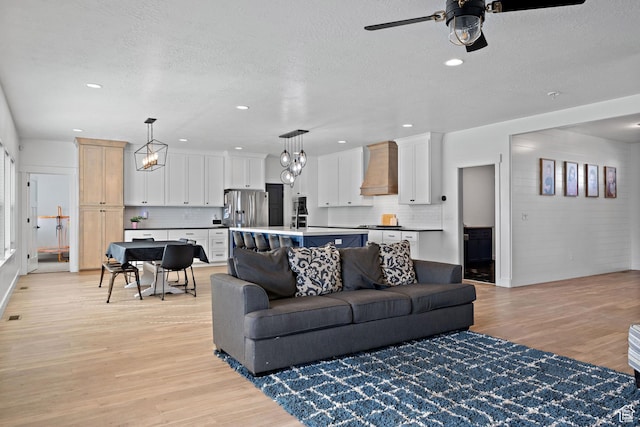 1807 S Bridle Path Loop, Lehi, UT 84043 - living area featuring ceiling fan, a textured ceiling, light wood-type flooring, and recessed lighting