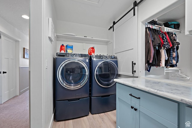 1807 S Bridle Path Loop, Lehi, UT 84043 - laundry area featuring cabinet space, washer and clothes dryer, visible vents, and a barn door