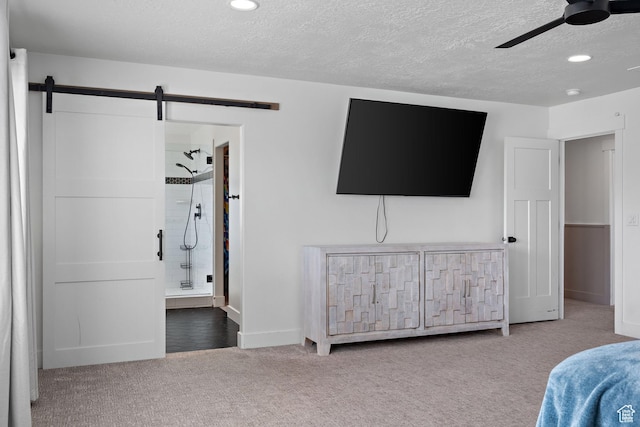 1807 S Bridle Path Loop, Lehi, UT 84043 - bedroom featuring a textured ceiling, carpet, a barn door, and recessed lighting