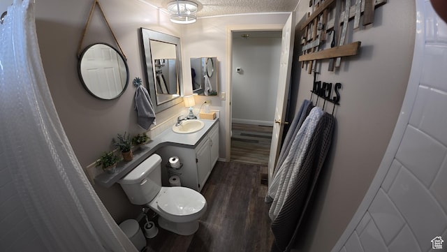 102 W Alta View Way Unit 7, Sandy, UT 84070 - full bathroom featuring toilet, wood finished floors, vanity, and a textured ceiling