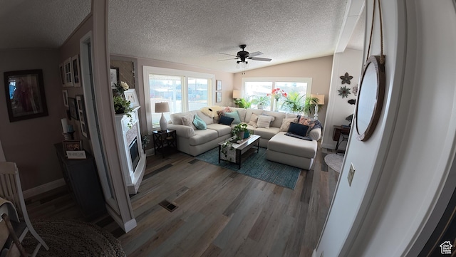 102 W Alta View Way Unit 7, Sandy, UT 84070 - living area with vaulted ceiling, wood finished floors, a textured ceiling, baseboards, and ceiling fan
