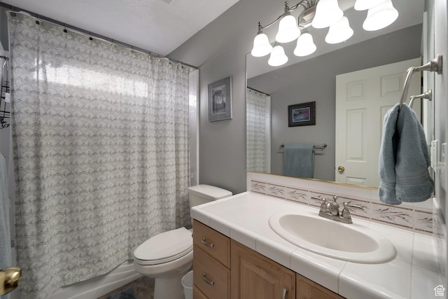 full bath with shower / bath combination with curtain, toilet, and vanity