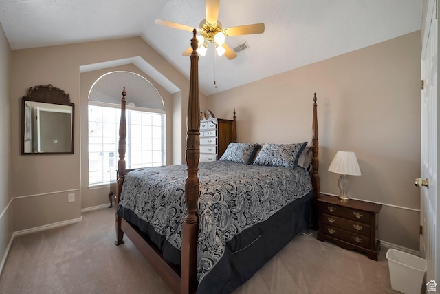 bedroom featuring vaulted ceiling, carpet, baseboards, visible vents, and a ceiling fan