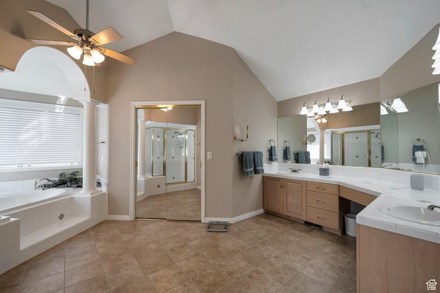 bathroom featuring a bath, ceiling fan, a sink, and a shower stall