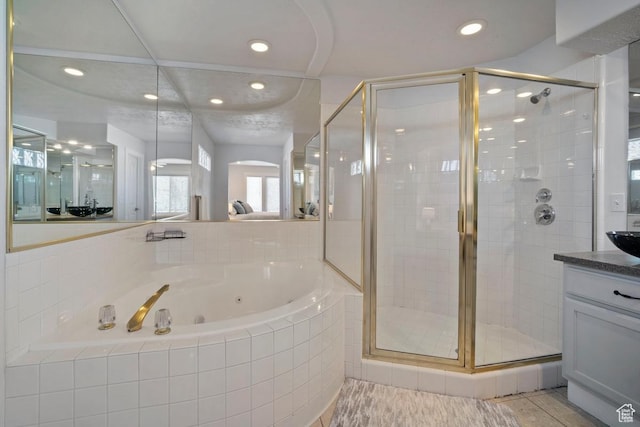 28 E 1400 N, Mapleton, UT 84664 - bathroom with vanity, a stall shower, recessed lighting, and a whirlpool tub