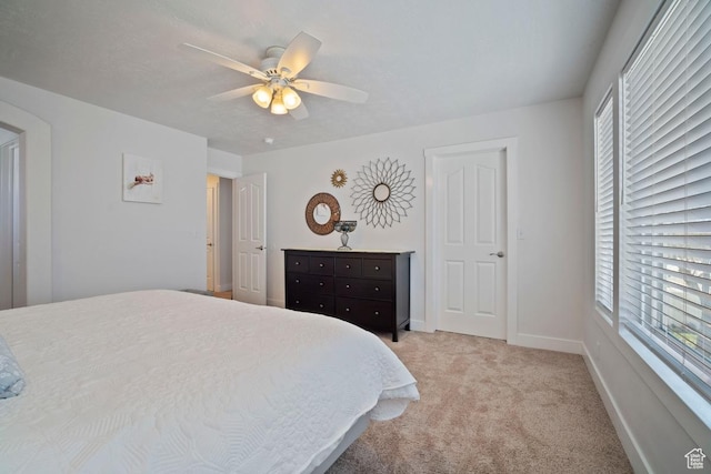 28 E 1400 N, Mapleton, UT 84664 - bedroom featuring baseboards, ceiling fan, and light colored carpet