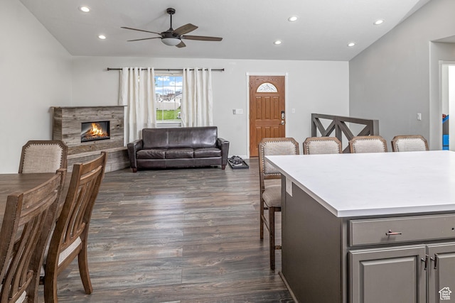 444 E 2720 N, North Logan, UT 84341 - living room with dark wood finished floors, ceiling fan, recessed lighting, and a stone fireplace
