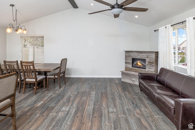 444 E 2720 N, North Logan, UT 84341 - living room with dark wood finished floors, a lit fireplace, ceiling fan, plenty of natural light, and recessed lighting