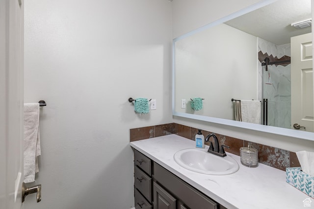 444 E 2720 N, North Logan, UT 84341 - bathroom featuring vanity and a marble finish shower