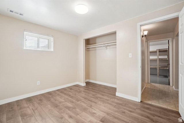 240 W 220 S, Orem, UT 84058 - unfurnished bedroom featuring baseboards, visible vents, a closet, and light wood-style flooring