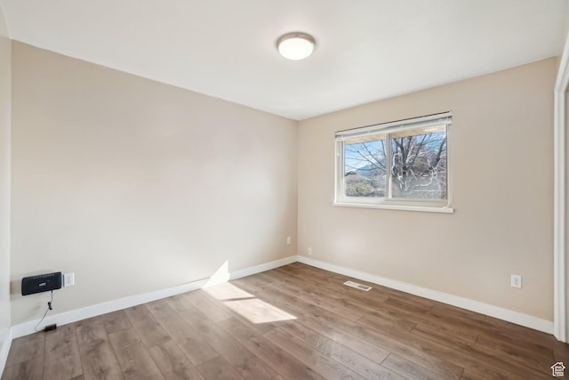 240 W 220 S, Orem, UT 84058 - spare room with baseboards, visible vents, and wood finished floors