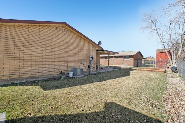 240 W 220 S, Orem, UT 84058 - view of side of home featuring fence, a patio, brick siding, central AC, and a yard