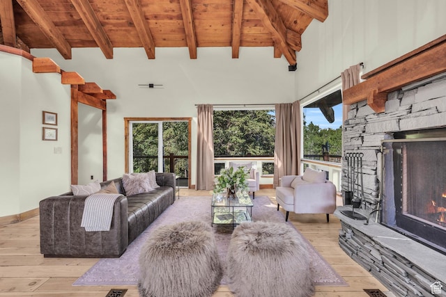 2421 S Navajo Unit Pi-C50, Coalville, UT 84017 - living area featuring beamed ceiling, a fireplace, wooden ceiling, and hardwood / wood-style floors
