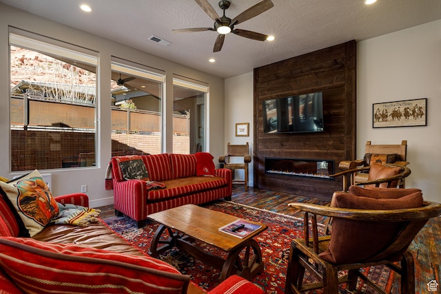 533 E Cutter Trl, Kanab, UT 84741 - living area featuring a ceiling fan, recessed lighting, a textured ceiling, and visible vents