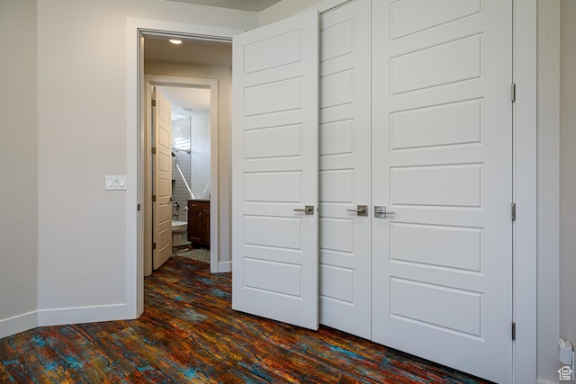 533 E Cutter Trl, Kanab, UT 84741 - interior space with dark wood-style floors, a closet, and baseboards