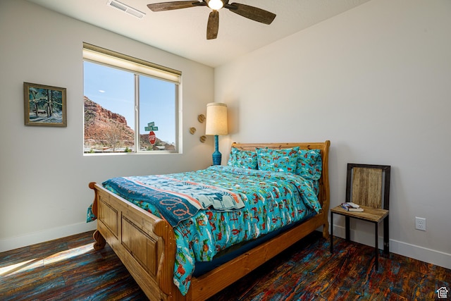 533 E Cutter Trl, Kanab, UT 84741 - bedroom with a ceiling fan, wood finished floors, baseboards, and visible vents