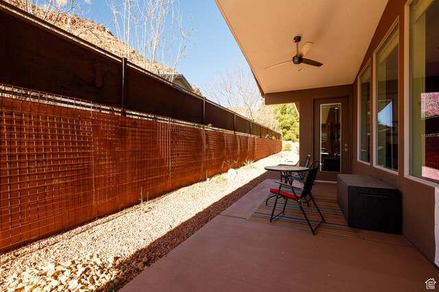 533 E Cutter Trl, Kanab, UT 84741 - view of patio / terrace featuring a ceiling fan and fence