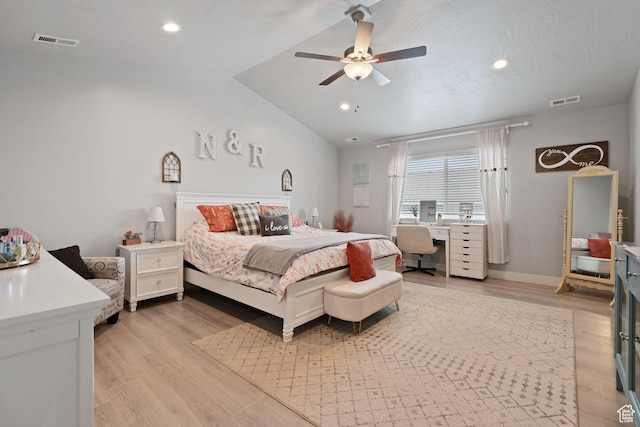 7016 N Amber Mead Ave, Eagle Mountain, UT 84005 - bedroom featuring visible vents, light wood-style flooring, and vaulted ceiling