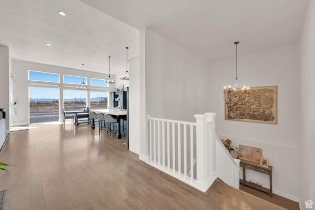 2266 S Betsys Way, Kaysville, UT 84037 - hall with a chandelier, an upstairs landing, wood finished floors, and recessed lighting