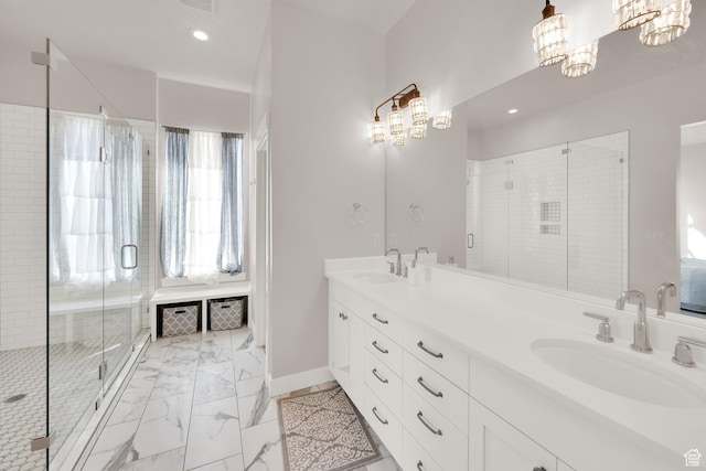 2266 S Betsys Way, Kaysville, UT 84037 - bathroom with a shower stall, double vanity, marble finish flooring, recessed lighting, and baseboards
