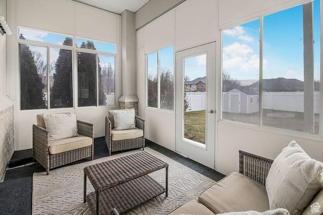 sunroom with carpet floors