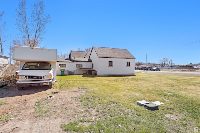 exterior space with a lawn
