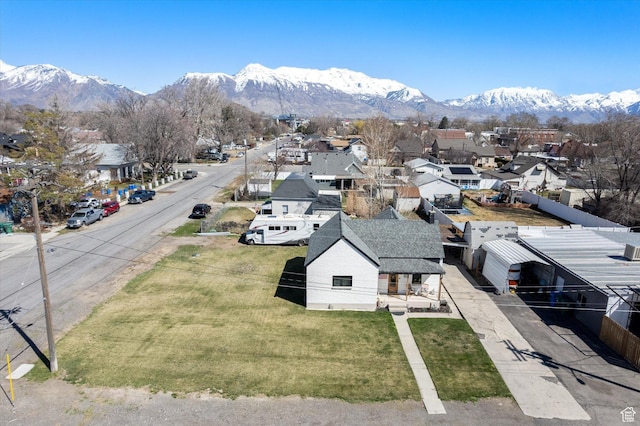 drone / aerial view featuring a mountain view and a residential view