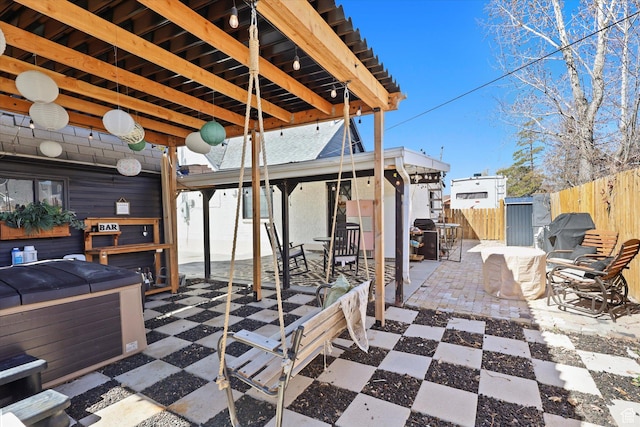 view of patio featuring fence and outdoor dining area