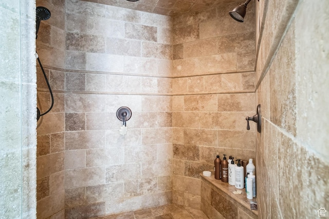 full bathroom with tiled shower