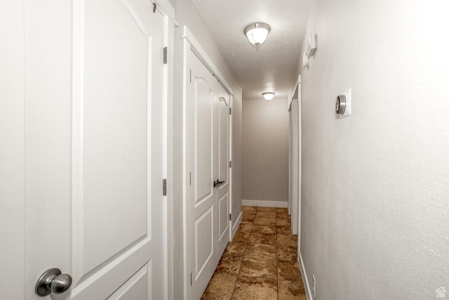 2164 S Alison Row, St George, UT 84790 - corridor featuring baseboards and a textured ceiling