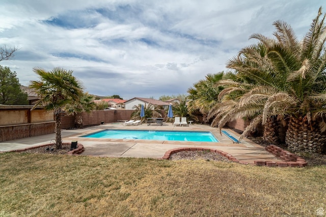 2164 S Alison Row, St George, UT 84790 - view of swimming pool with a fenced backyard, a fenced in pool, a yard, and a patio
