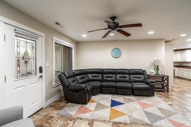 2164 S Alison Row, St George, UT 84790 - living room featuring baseboards, visible vents, stone tile flooring, and recessed lighting