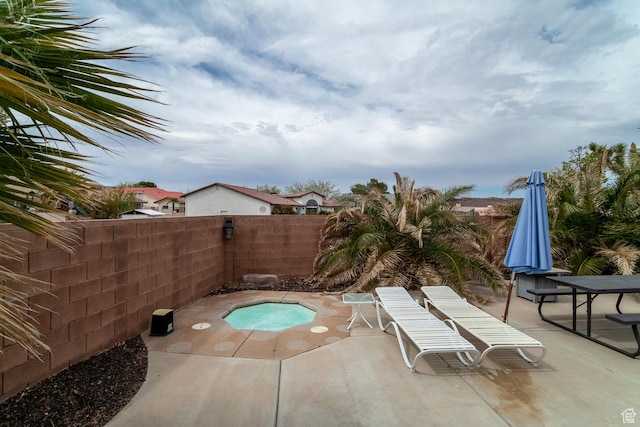 2164 S Alison Row, St George, UT 84790 - view of pool with fence, an in ground hot tub, and a patio