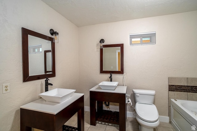 2164 S Alison Row, St George, UT 84790 - full bathroom with toilet, a sink, tile patterned floors, and a bath