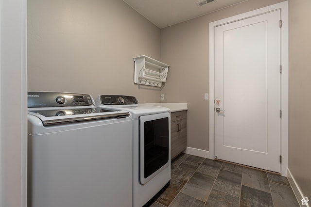 484 E Mohawk Dr, Kanab, UT 84741 - laundry room with cabinet space, baseboards, separate washer and dryer, and visible vents