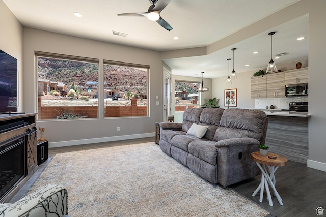 484 E Mohawk Dr, Kanab, UT 84741 - living room featuring a ceiling fan, recessed lighting, baseboards, and wood finished floors