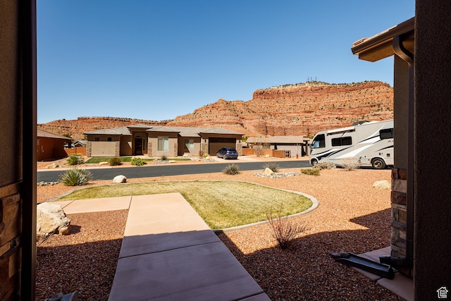 484 E Mohawk Dr, Kanab, UT 84741 - view of yard with a mountain view and a residential view