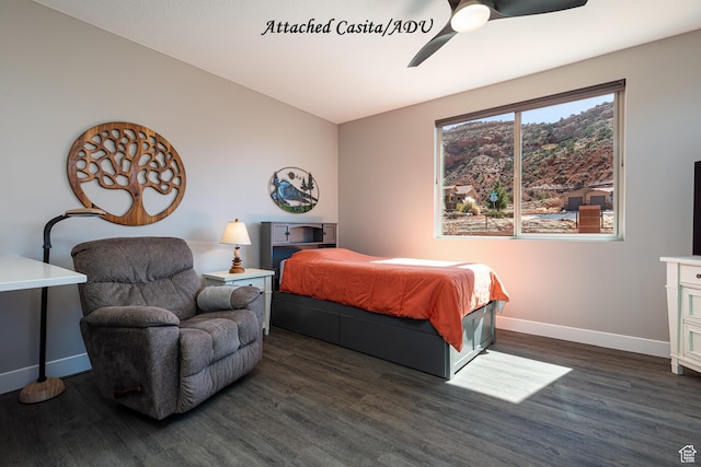 484 E Mohawk Dr, Kanab, UT 84741 - bedroom featuring baseboards, wood finished floors, and a ceiling fan