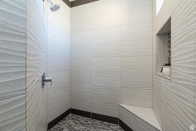 484 E Mohawk Dr, Kanab, UT 84741 - bathroom featuring tiled shower and tile walls